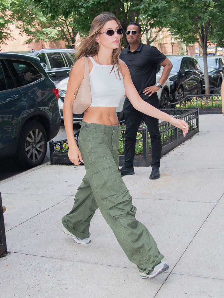 Hailey Bieber models the Bulgari x Alexander Wang handbag