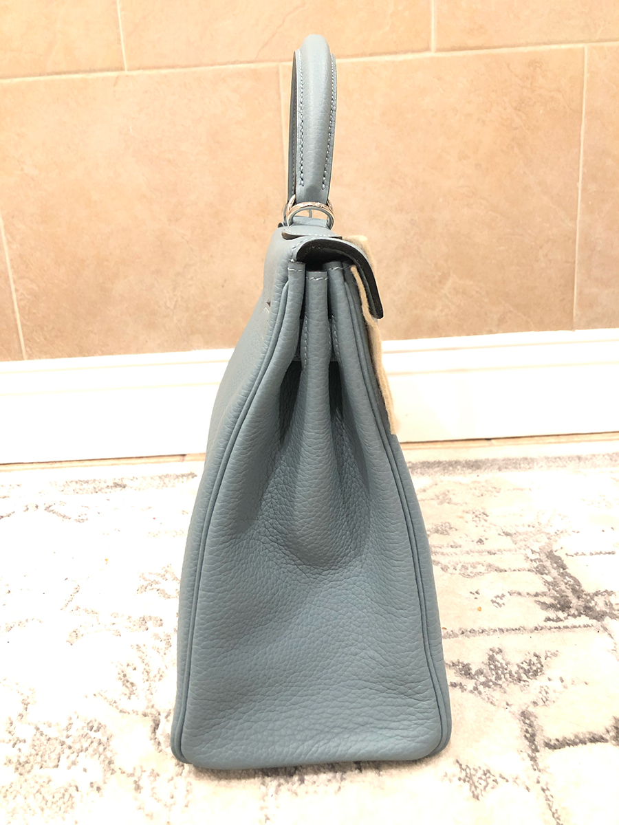 Side view of a Clemence bag.