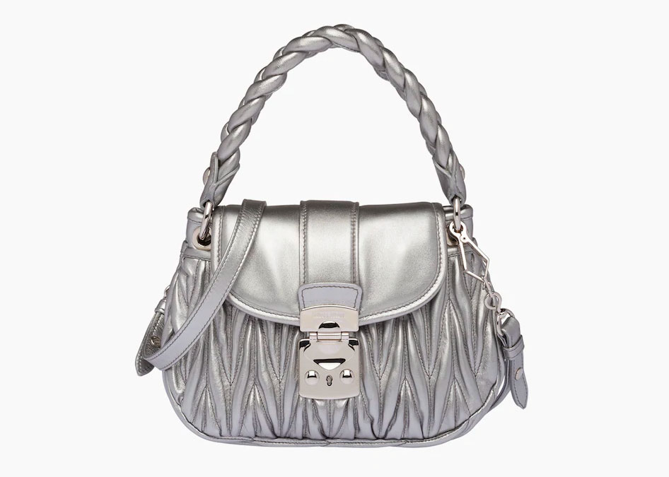 Miu Mius had this style of bag out for awhile and it was Dooney who in fact  copied Miu Miu, Loewe Anagram Tote 394876