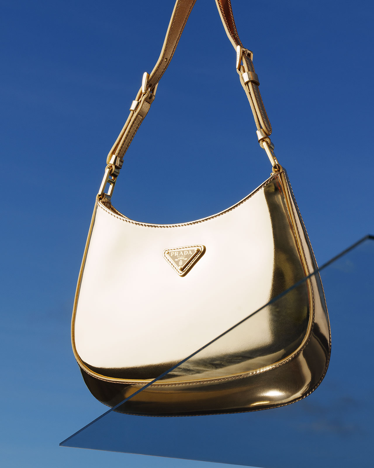 All that Glitters is Gold for Prada Holiday - PurseBlog