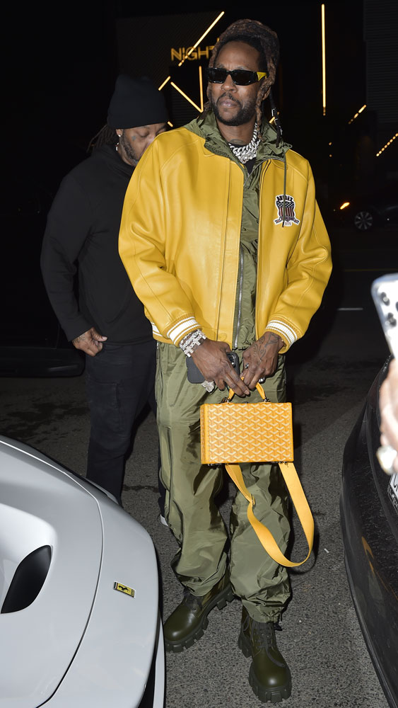 Celebs Kick Off the New Year With Prada and Bottega prada single breasted belted trench coat item ParallaxShops