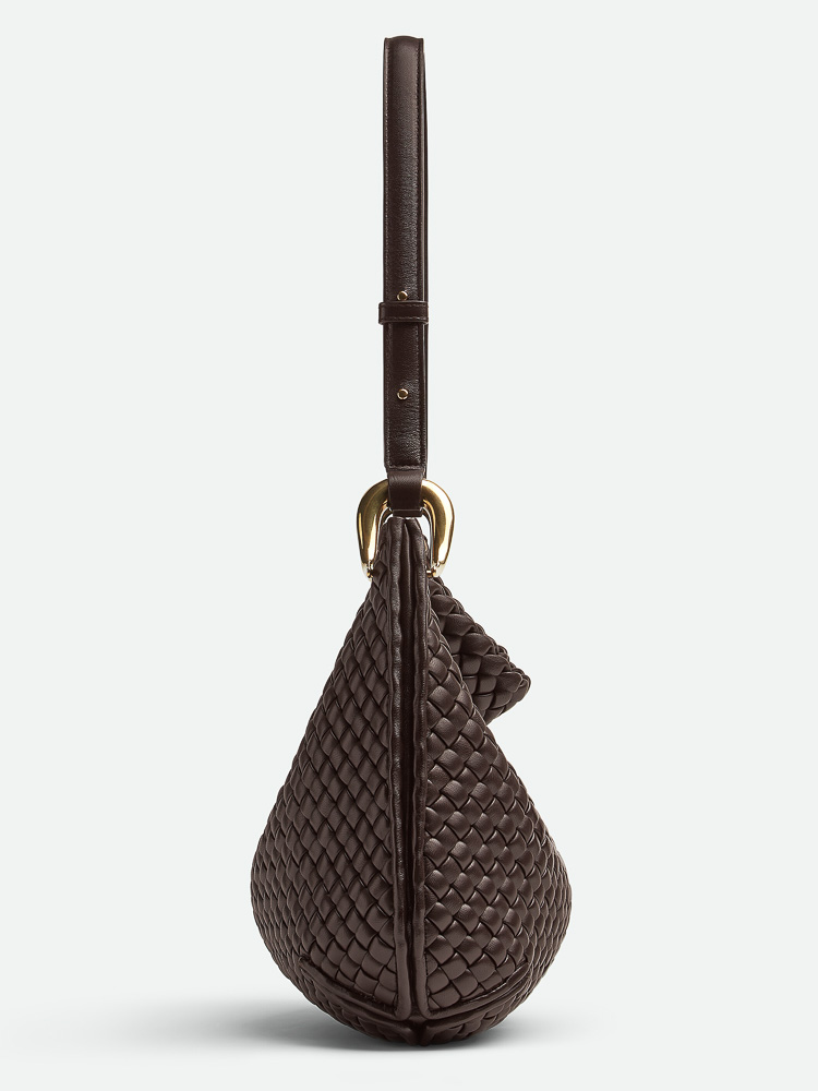 The Bottega Veneta Clicker Bag Marries House History with