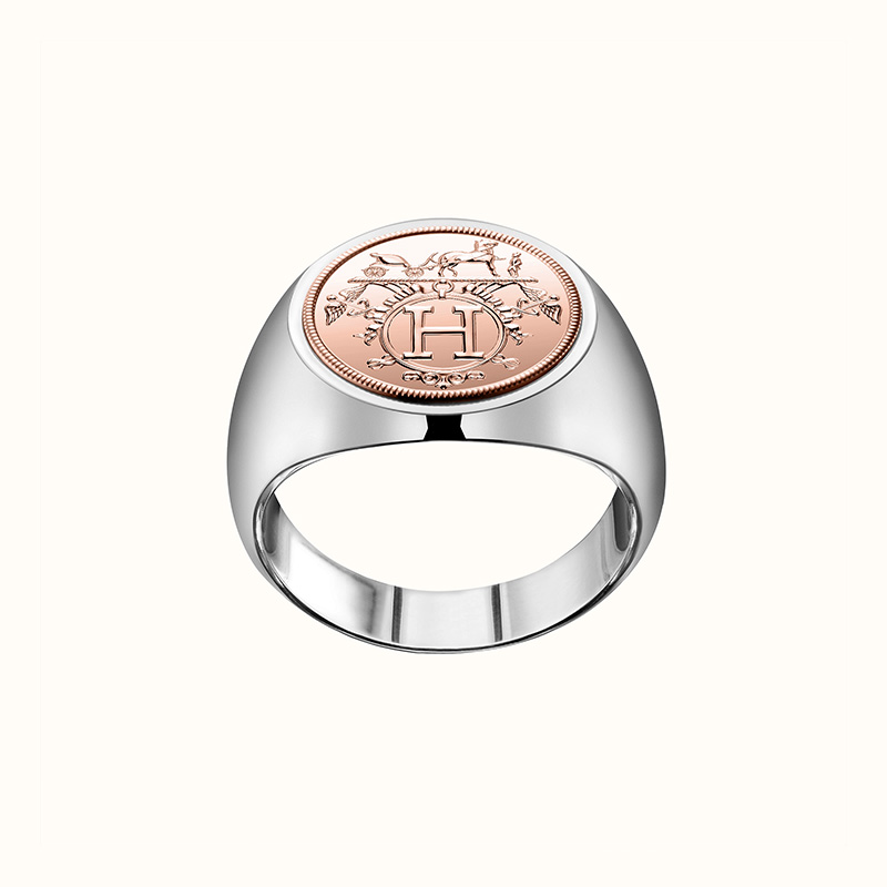 Ex Libris Ring in Rose Gold and Sterling Silver, approximately $1200 (€1110). Photo via Hermes.com
