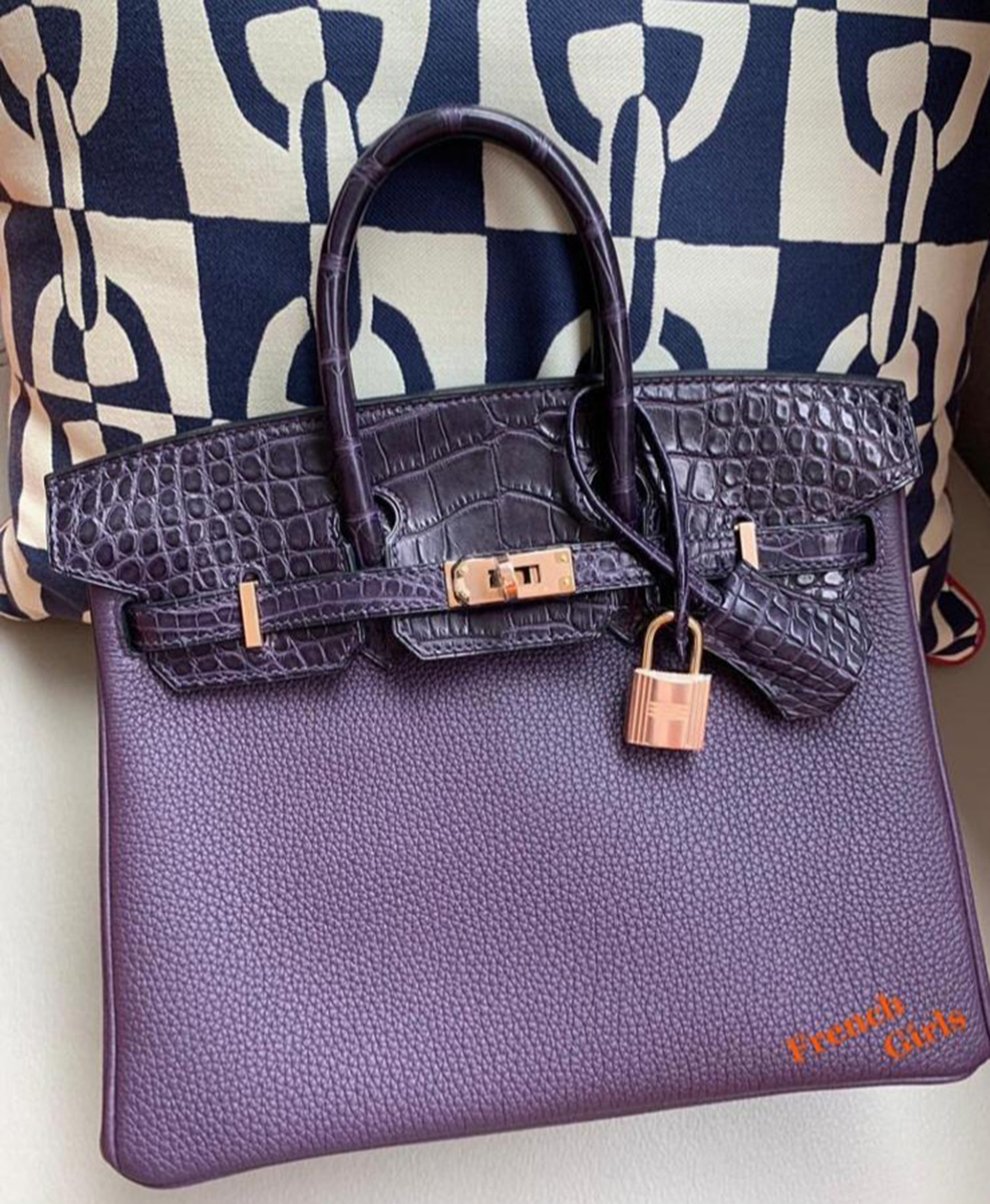 A 30cm Birkin in Raisin Togo with Prunoir Matte Croc and RGHW from May 2019. Photo via Instagram @FrenchGirls.