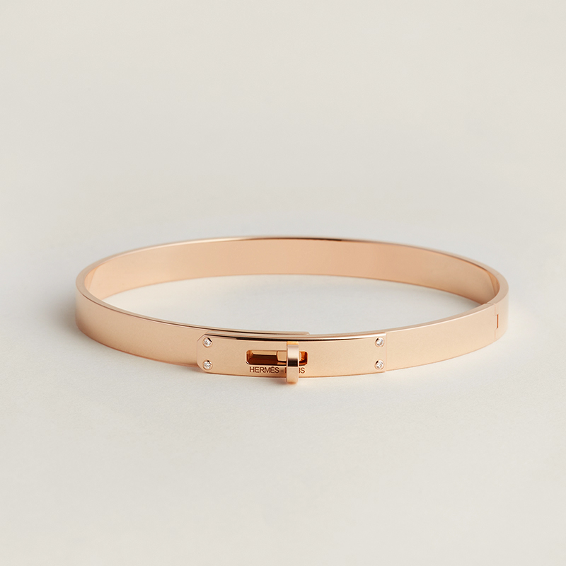 Kelly Bracelet in Rose Gold with 4 diamonds (total carat weight .2 ct), $9000. Photo via Hermes.com