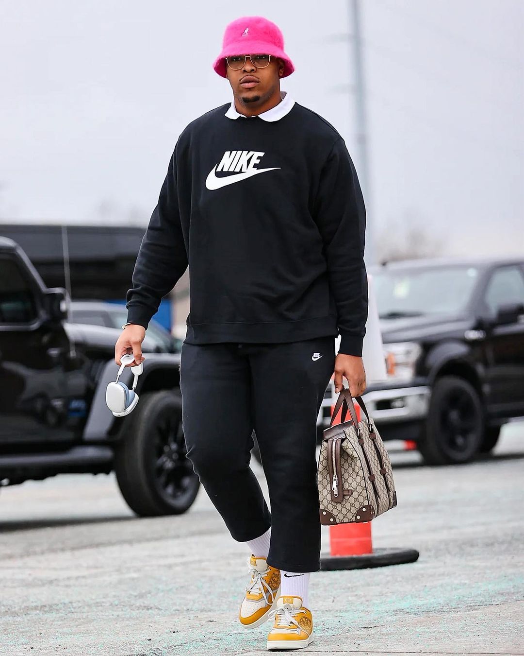 This football star loves his $4,500 Louis Vuitton backpack