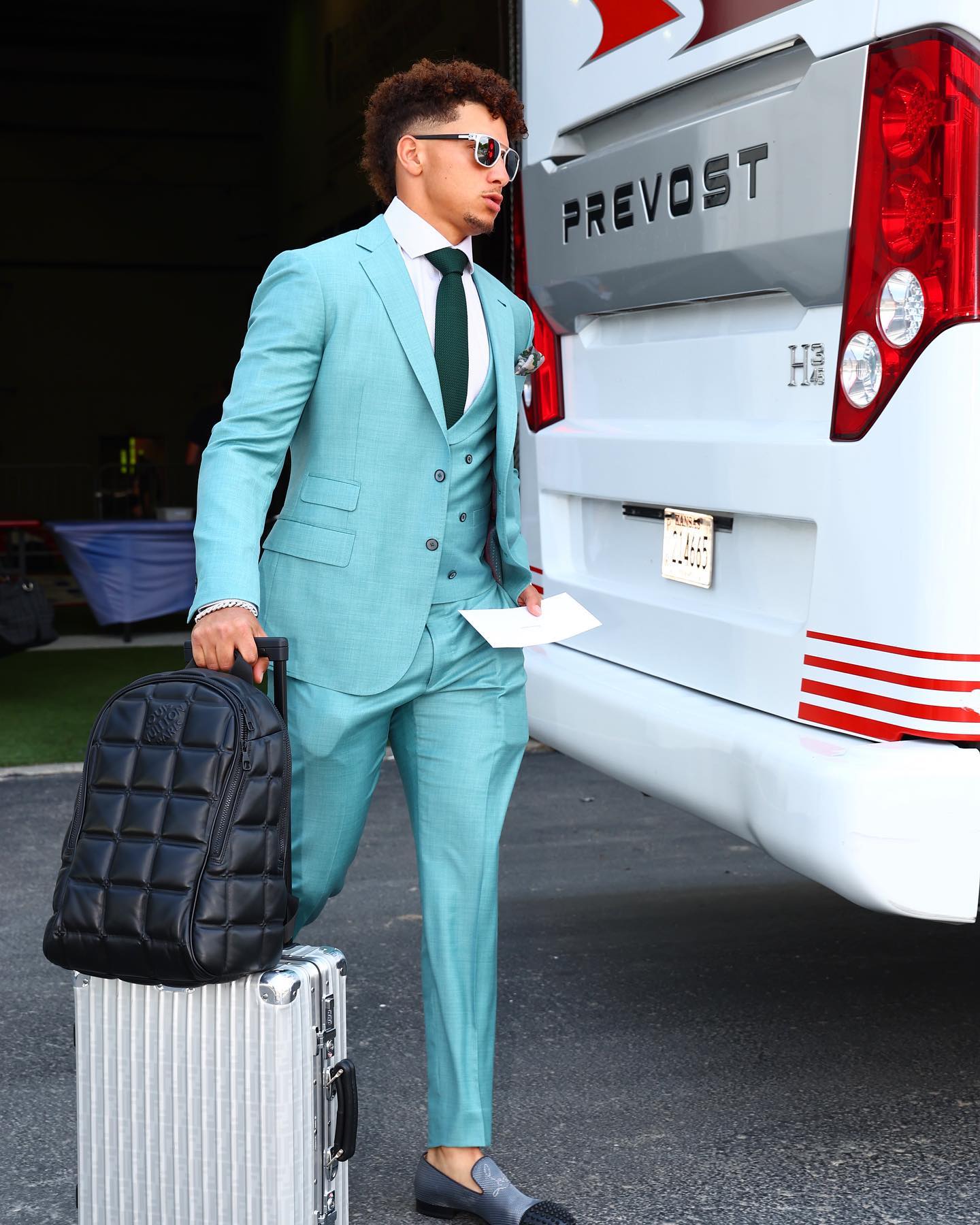 This football star loves his $4,500 Louis Vuitton backpack