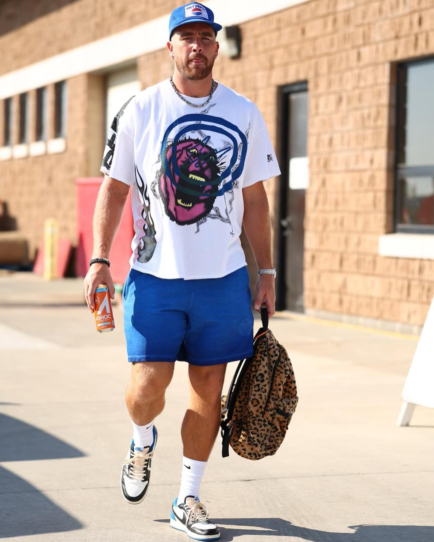 travis kelce louis vuitton bag