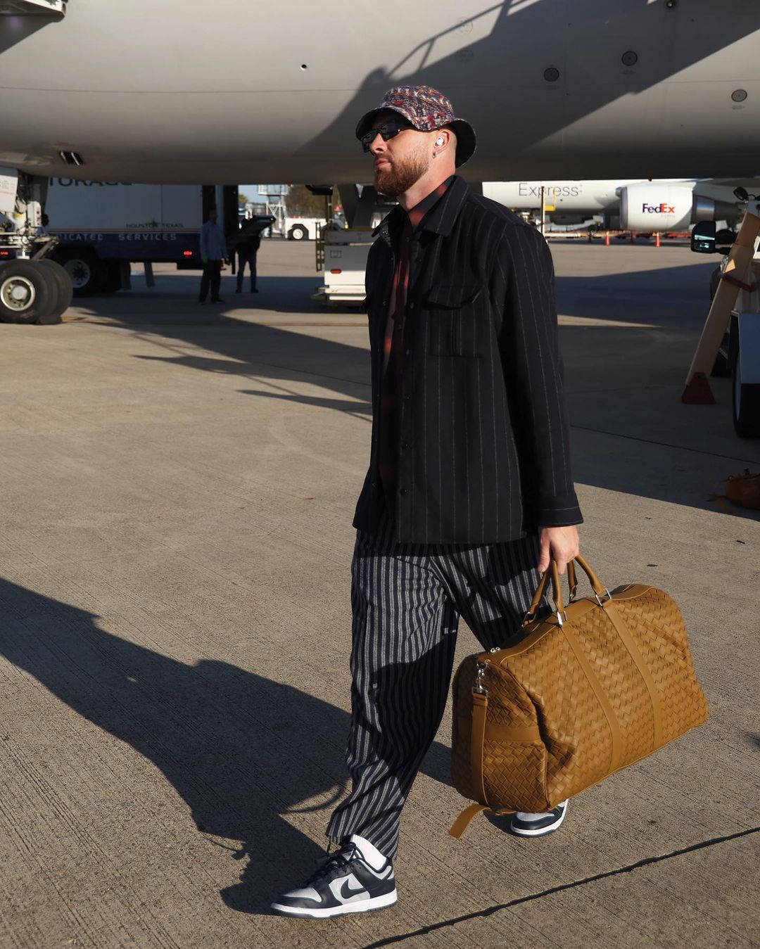 travis kelce bottega veneta duffle