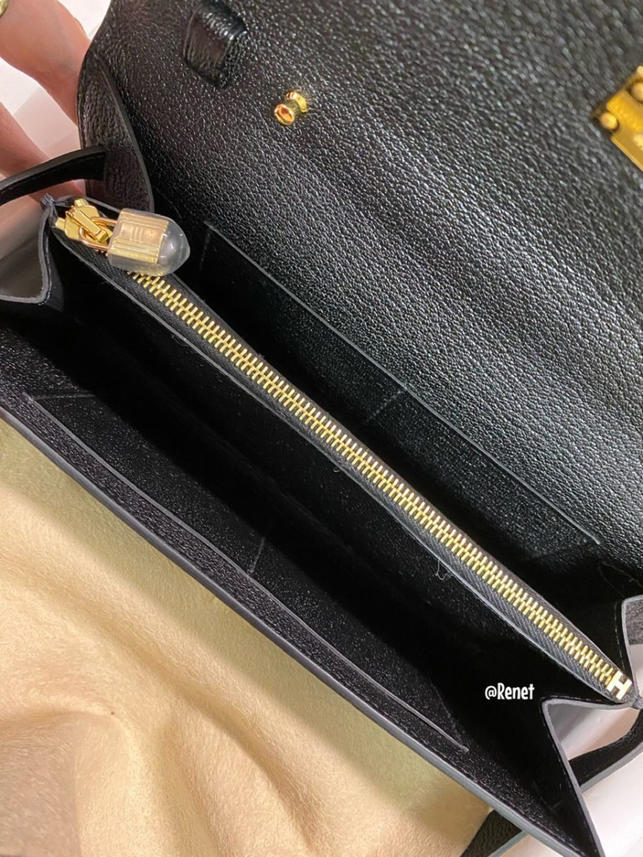 The Interior of the Kelly To Go features 4 card slots and a zip compartment. Photo via TPFer @renet. The Interior of the Kelly To Go features 4 card slots and a zip compartment. Photo via TPFer @renet.