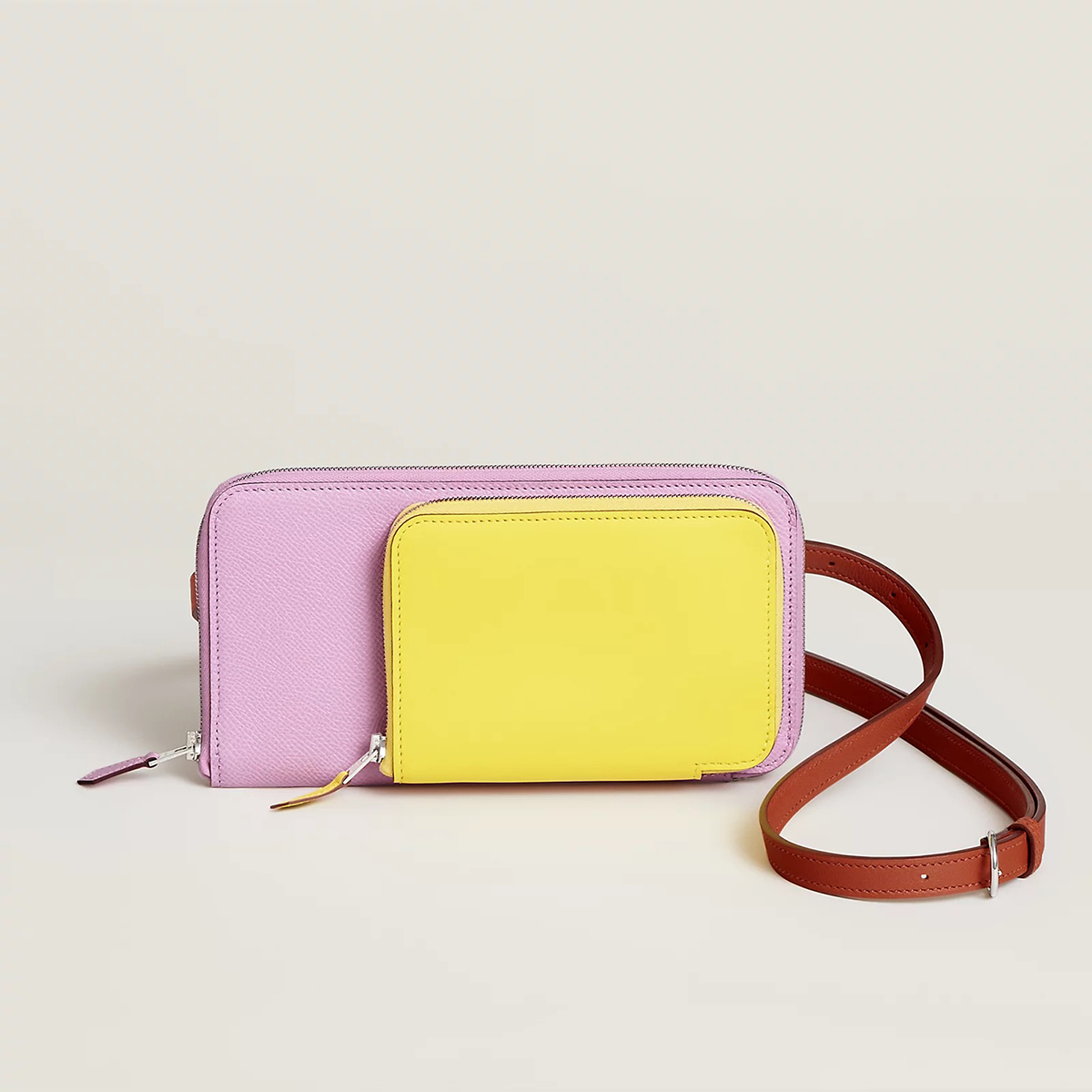 Ví Hermès Nouveau To Go màu tím Sylvestre/chanh/cuivre/caban. Ảnh qua Hermes.com