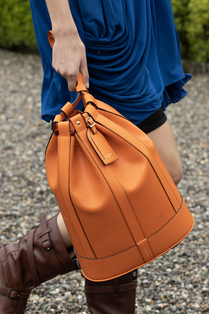 orange and black louis vuittons handbags