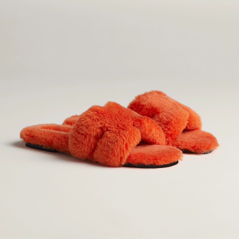 Orange Oran Sandals in Shearling, $1025. Photo via Hermès.com.