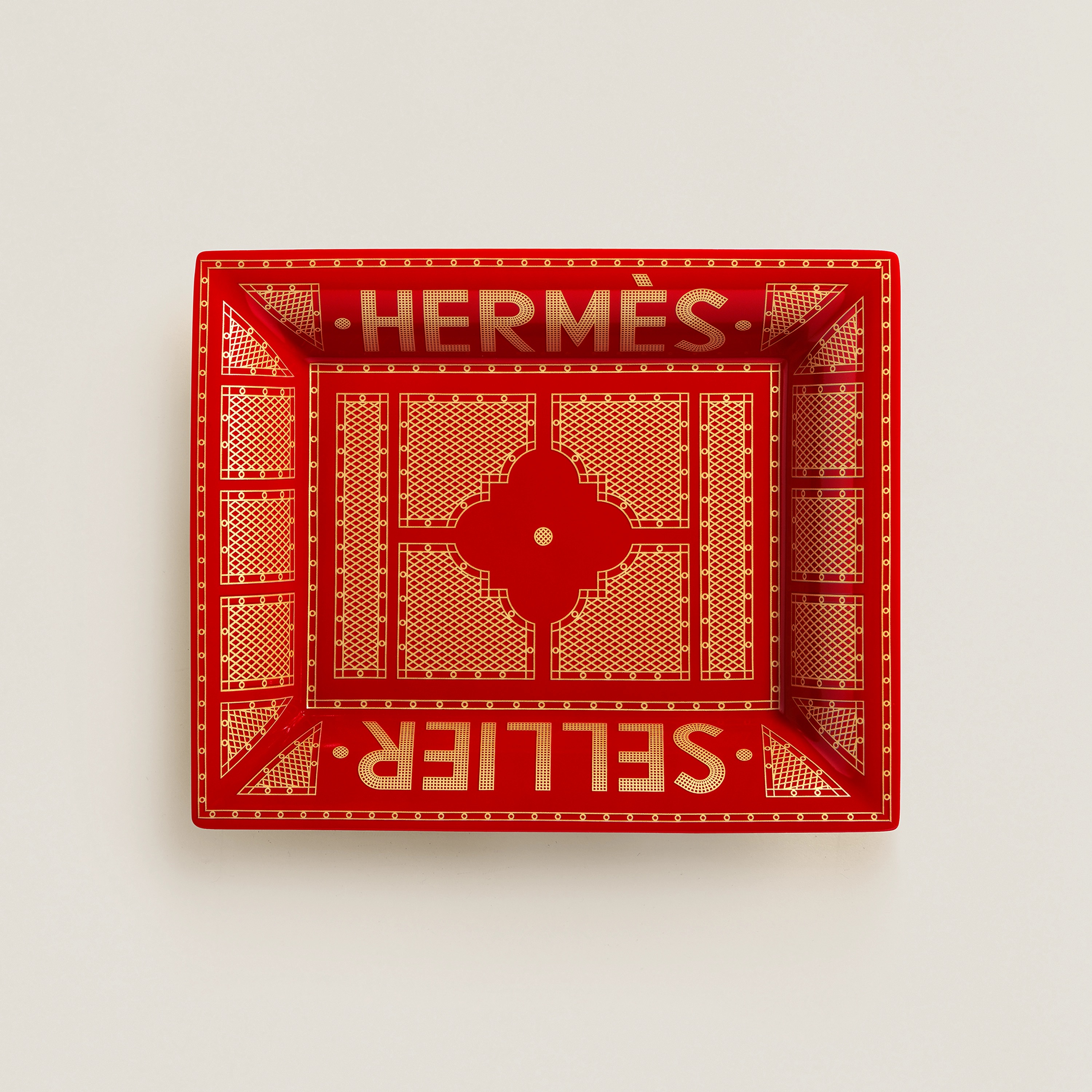 Hermès Sellier change tray in porcelain. Measures 8.3" long x 6.7" wide, $660. Photo via Hermès.com.