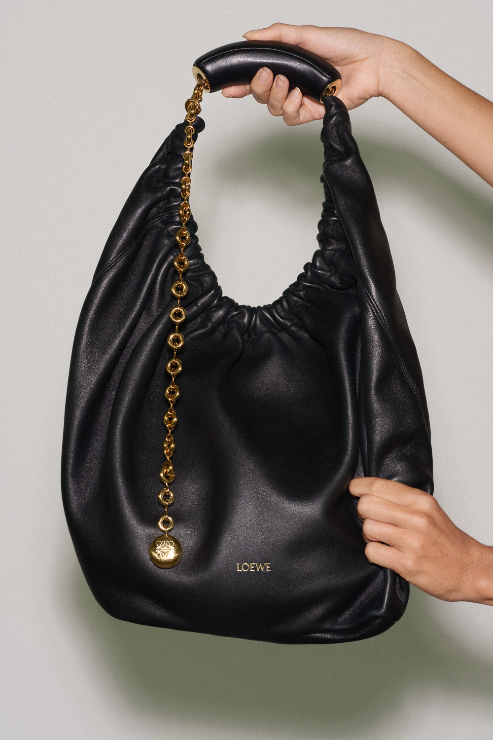 The Alluring Loewe Squeeze Bag Is Here - PurseBlog