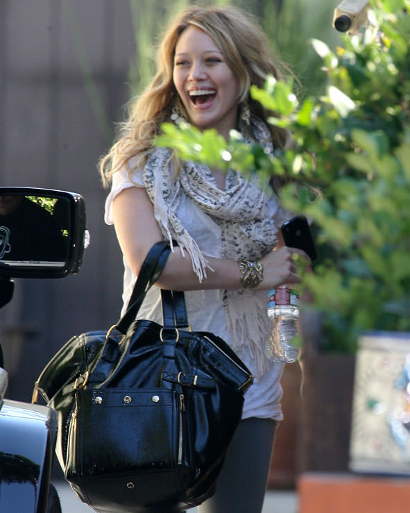 Hilary Duff Uses Goyard as a Baby Bag - PurseBlog