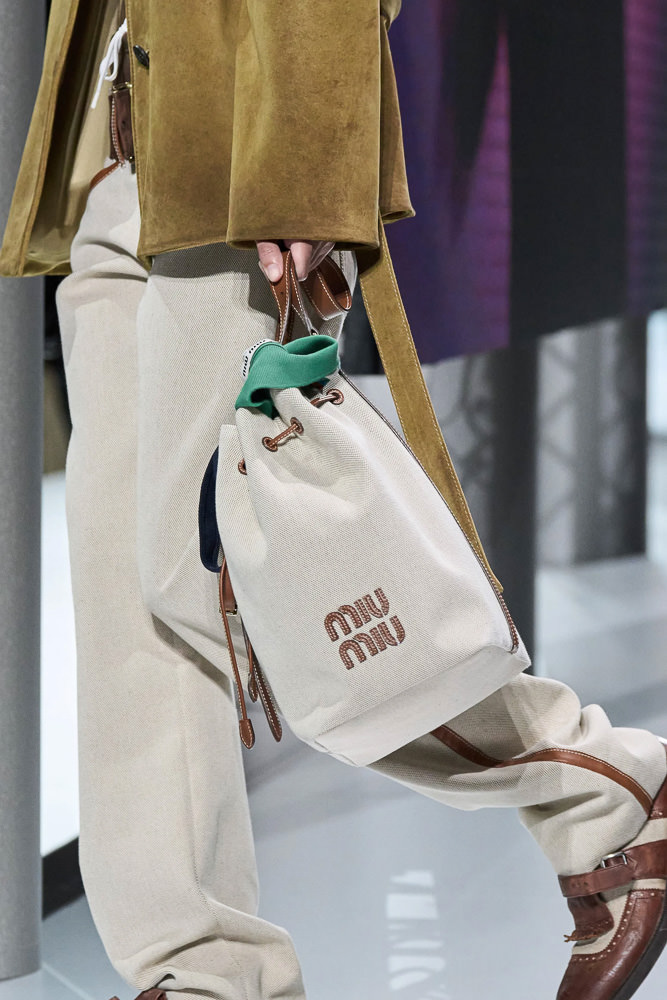 Balenciaga & Miu Miu's Overaccessorized Handbags Are Fashion