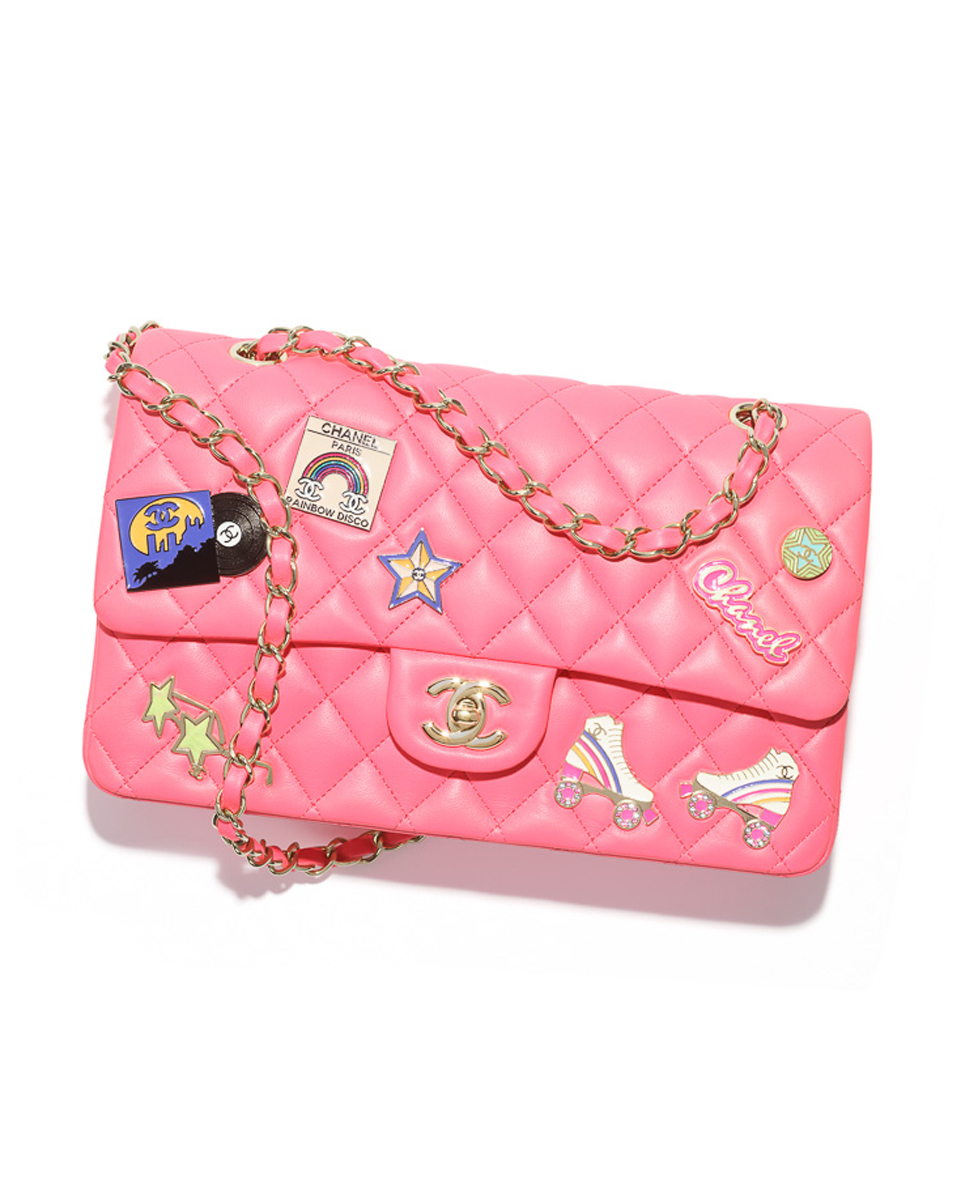 chanel bag in pink leather and metal embellished with charms A01112
