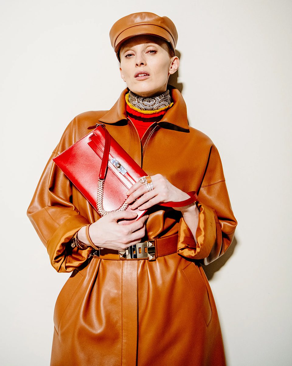 A Kelly Elan with a leather-and metal strap. Hermès AW24 Look 30. Photo via Vogue.com. A Kelly Elan with a leather-and metal strap. Hermès AW24 Look 30. Photo via Vogue.com.