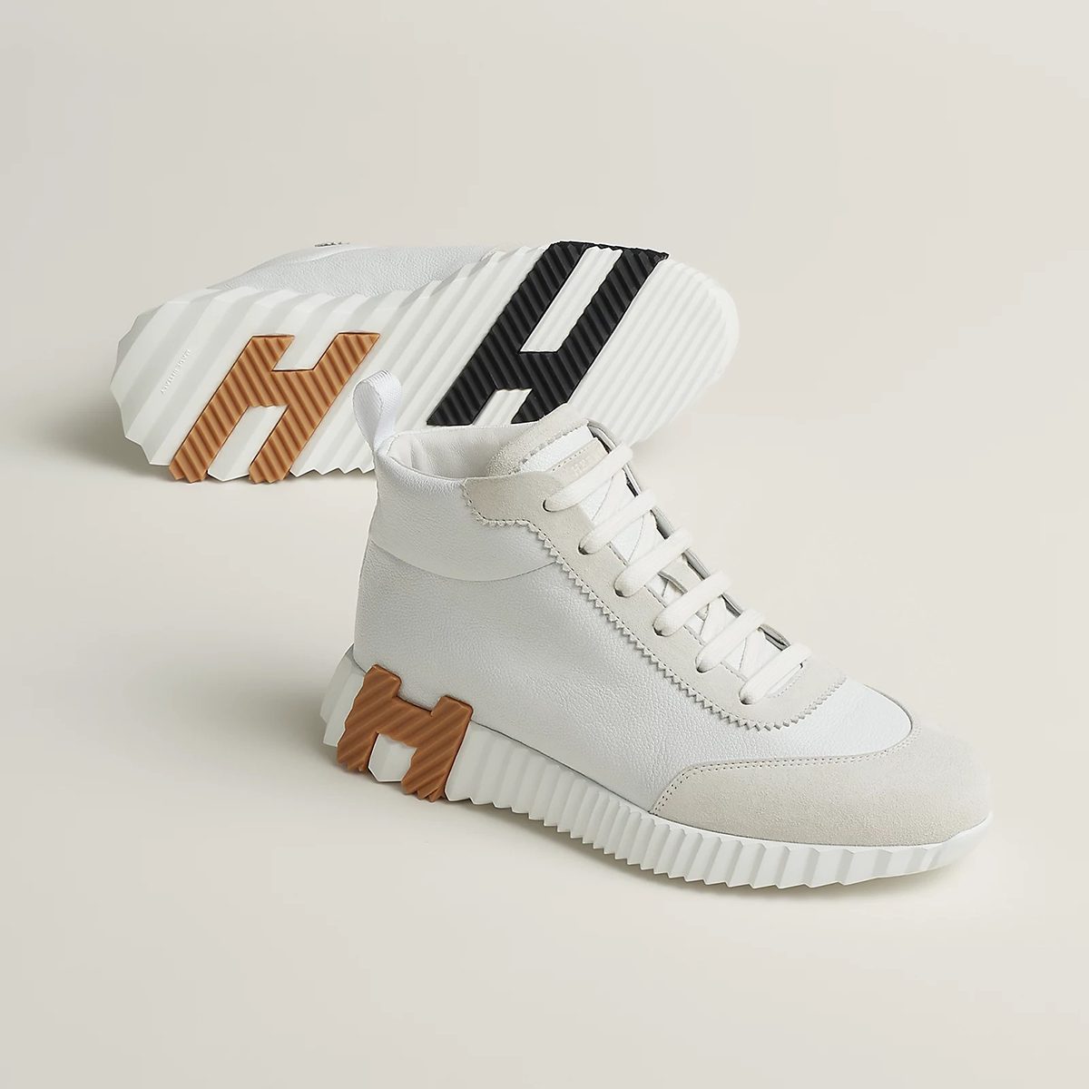 Hip-Hop Sneaker in Blanc Sport Suede and Goatskin Suede. Photo via Hermes.com.