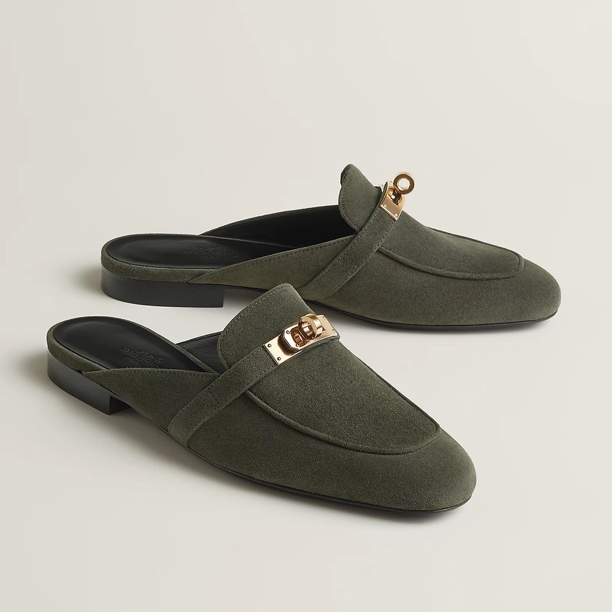 Oz Mule in Vert Forêt Suede with Permabrass Kelly Buckle. Photo via Hermes.com.