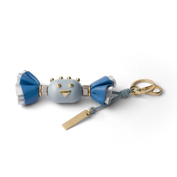 Playful Tricks Add a Whimsical Touch to the Iconic Prada Galleria This Season 8 Candy Plexiglas and leather key ring charm wave blue sky blue