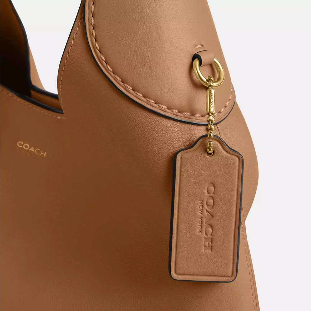 coach 28 honey brown