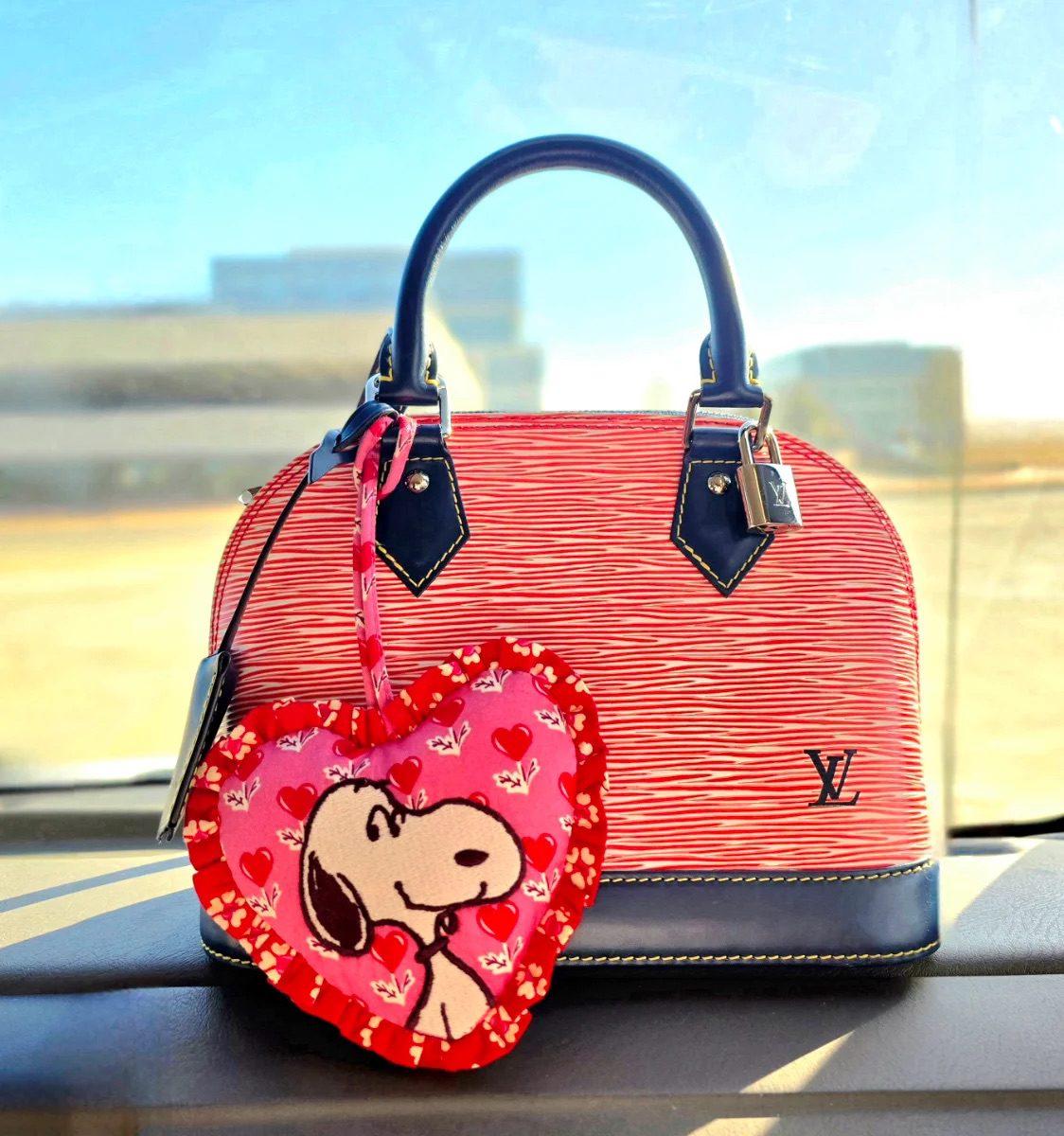 Louis Vuitton Alma BB Epi leather handbag