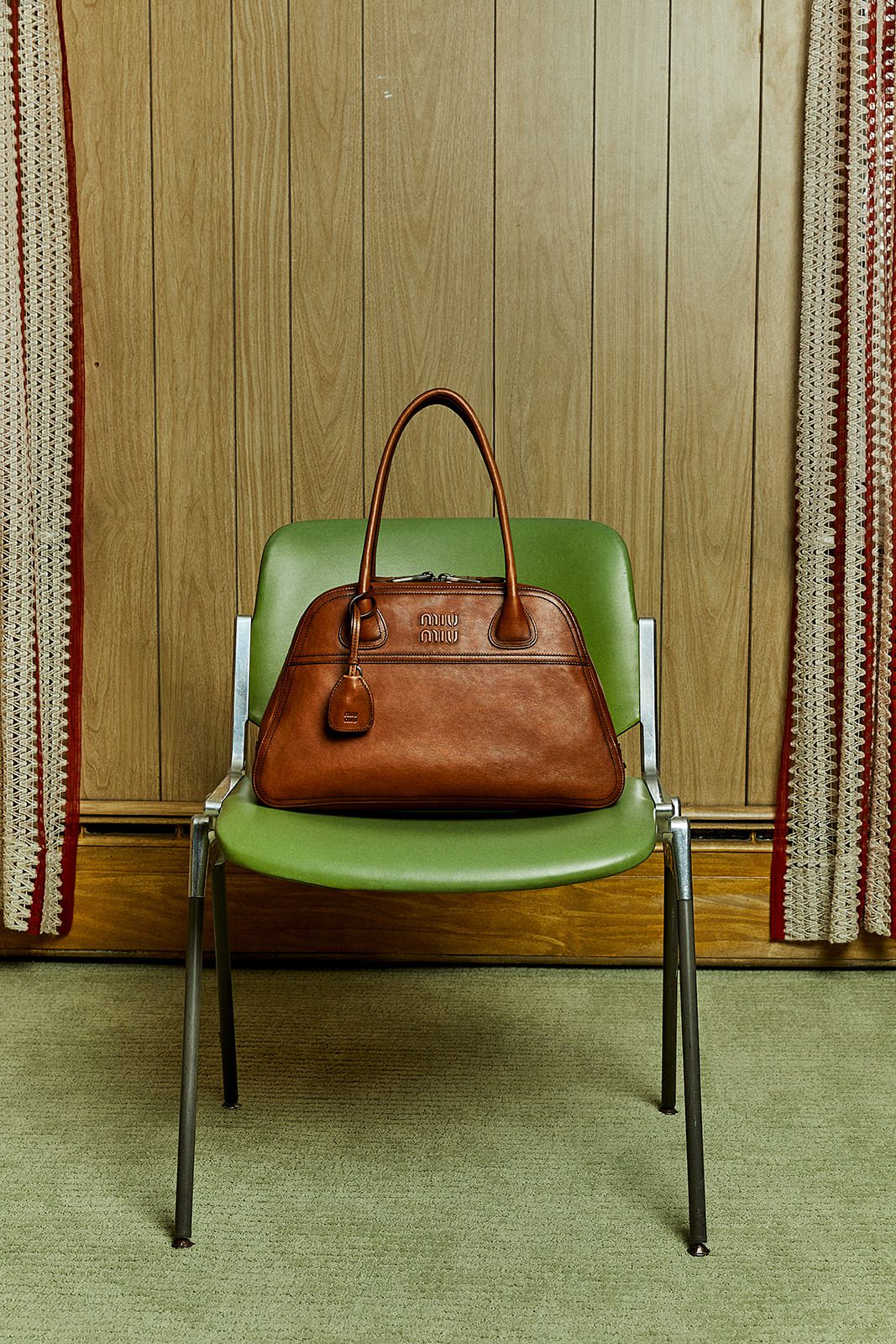 Vivant Leather Bag in Cognac on Chair