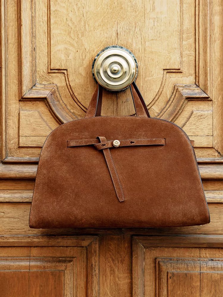 Tory Burch's Ever-Popular Romy Family of Bags Just Got a New Edition 4 Tory Burch Romy Bauletto Suede Medium