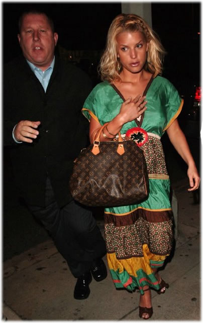 Jessica Simpson sporting a Louis Vuitton handbag, goes to visit