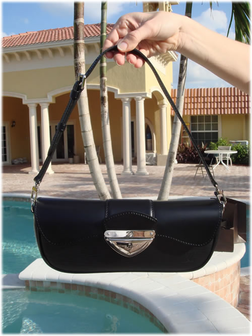 LV Montaigne Clutch