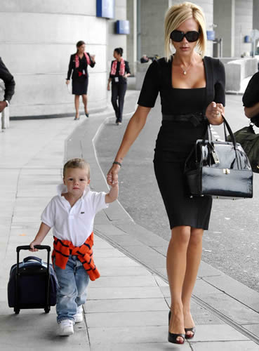 David and Victoria Beckham Leave Paris with Louis Vuitton Luggage -  PurseBlog
